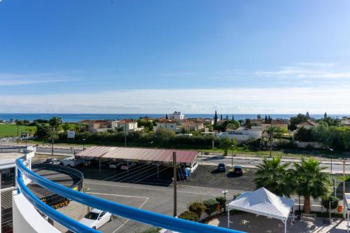 a view from a balcony of a parking lot at Mariandy Hotel in Larnaka