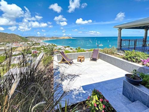 a patio with a view of the ocean at Blue Room in a shared Villa Diamant with communal pool and sea view in Grand Case