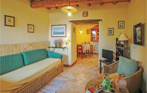 a living room with a couch and a table at Rondine in Smirra