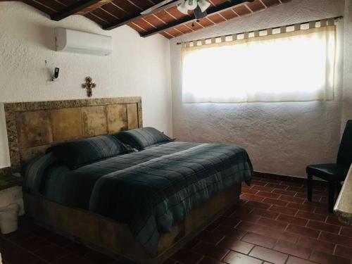 A bed or beds in a room at Casa Totalmente Equipada en Playa Algodones