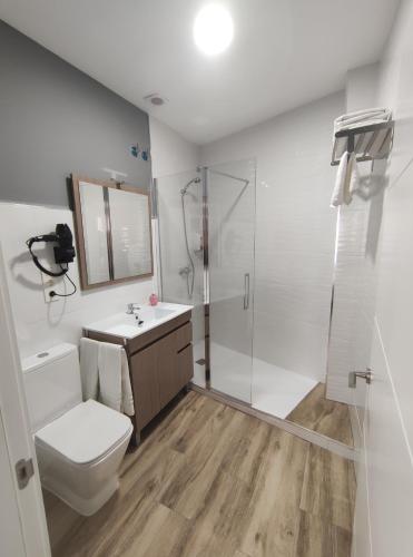 Kúpeľňa v ubytovaní Apartamentos Harmonia