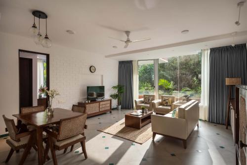 Χώρος καθιστικού στο El Arbol Apartments - Rooftop pool-Near Candolim-Wifi-24 hour Security