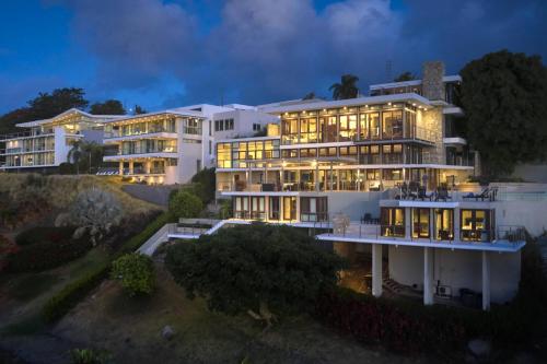 an aerial view of a large building at night at Happy Days Villa A in Fajardo