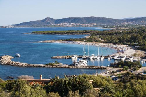 a view of a harbor with boats in the water at Residence Oasi Anfiteatro in Porto Ottiolu
