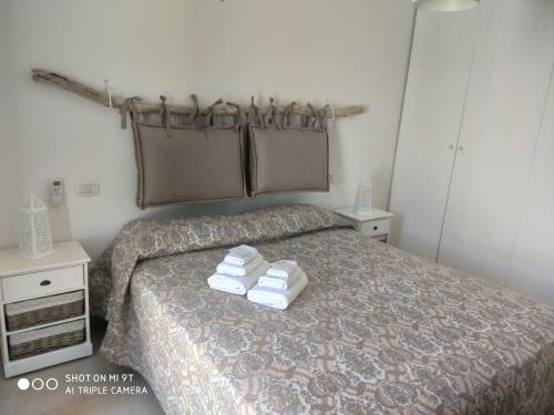 Ένα ή περισσότερα κρεβάτια σε δωμάτιο στο Casa Di Antonio