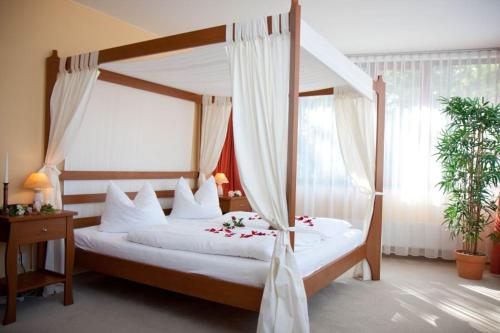 Postel nebo postele na pokoji v ubytování Hotel Balneolum Superior
