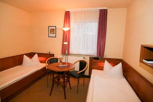 Postel nebo postele na pokoji v ubytování Hotel Balneolum Superior