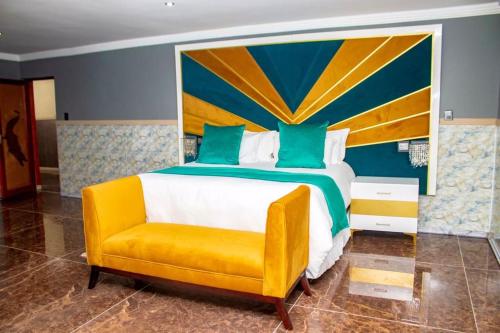 Cama o camas de una habitación en Xilumani Hotel