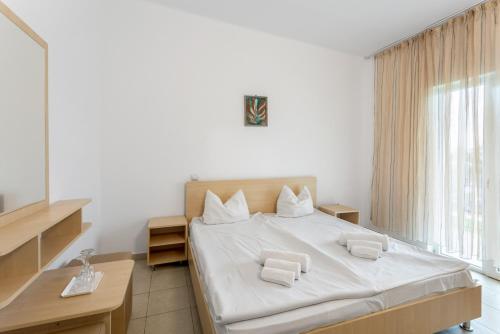 Postel nebo postele na pokoji v ubytování Hotel Vraja Marii