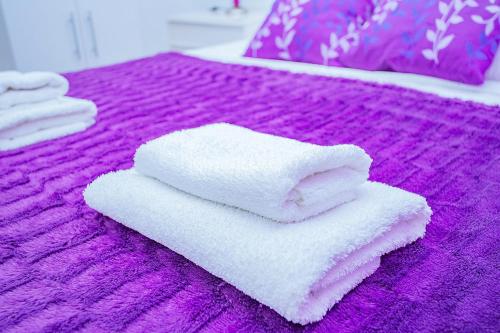 A bed or beds in a room at 075 Altos Magic House - Alicante Holiday
