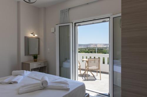 Ένα ή περισσότερα κρεβάτια σε δωμάτιο στο Prinos Oasis Twin Villas III