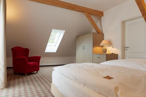 A bed or beds in a room at Elbresort Kurort Rathen