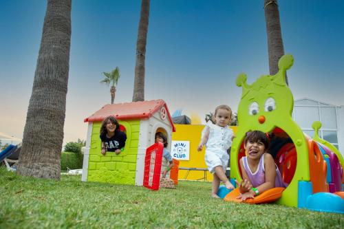 a group of children playing in a play park at Amadil Ocean Club in Agadir