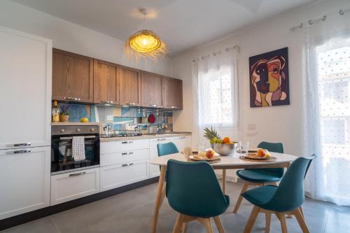 Η κουζίνα ή μικρή κουζίνα στο Imama' apartament vista mare