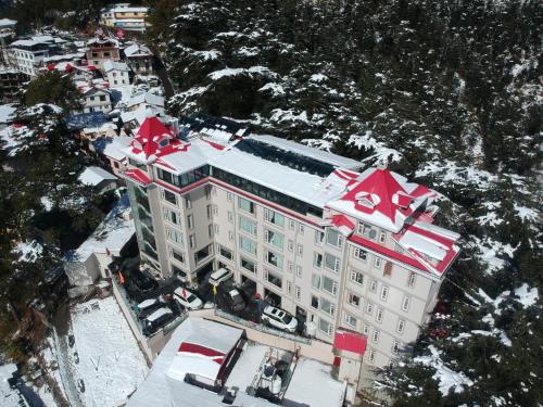 an overhead view of a building with red stars on it at WelcomHeritage Elysium Resort & Spa in Shimla