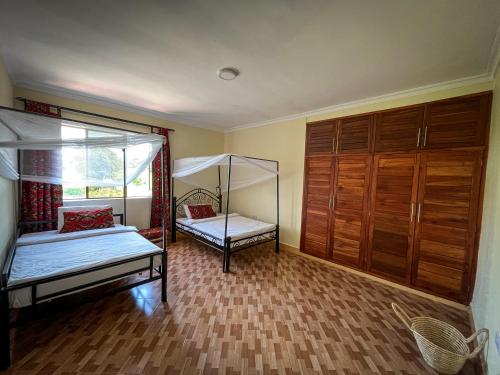 Villa Viva Tanzaniaにあるベッド