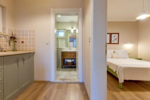 A bed or beds in a room at Gurel Garden House