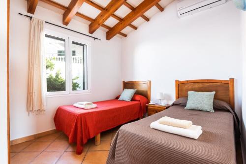 Postel nebo postele na pokoji v ubytování Villa Santi II by Villa Plus