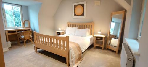 Cama o camas de una habitación en Dunkerron Woods Holiday Homes