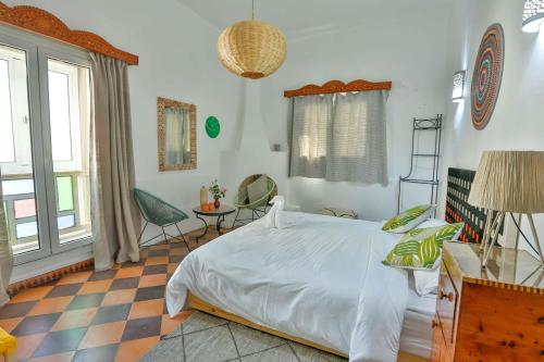 Postel nebo postele na pokoji v ubytování Luxury Riad Mounia