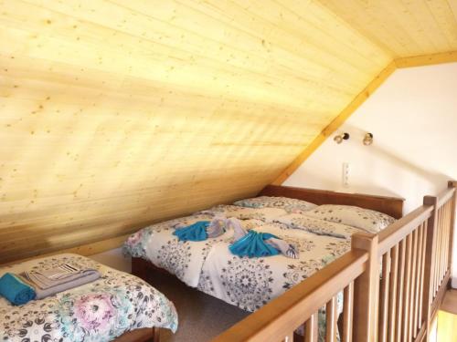 Katil atau katil-katil dalam bilik di Apartmány u Kameníka - Třeboň