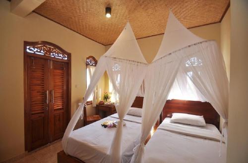 Cama o camas de una habitación en Meme Surung Guesthouse