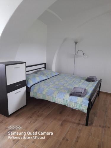Postel nebo postele na pokoji v ubytování Kojan