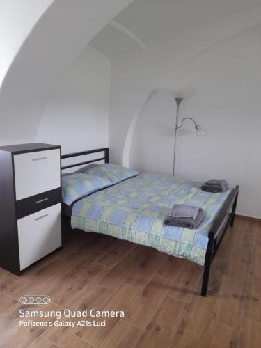 Ένα ή περισσότερα κρεβάτια σε δωμάτιο στο Kojan