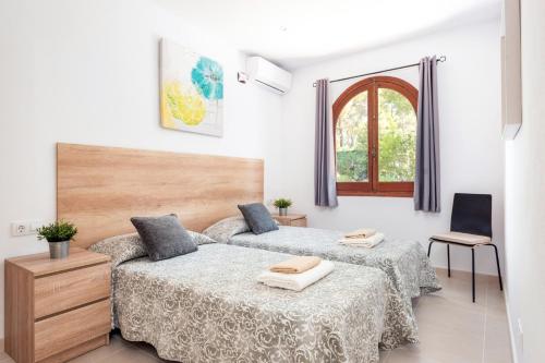 Posteľ alebo postele v izbe v ubytovaní Villa Casa Feliz by Villa Plus