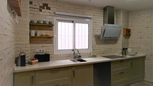 Kuchyňa alebo kuchynka v ubytovaní Casa Barbero