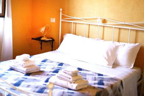 Letto o letti in una camera di Agriturismo Poggio Degli Ulivi