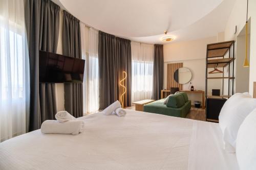 Ένα ή περισσότερα κρεβάτια σε δωμάτιο στο Casa Panorama Adults Only