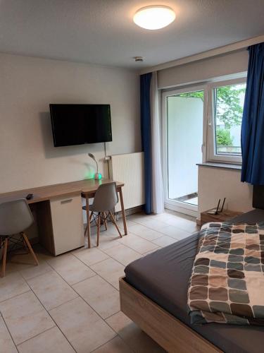 Postel nebo postele na pokoji v ubytování Business Apartment Reutlingen