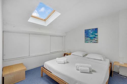 Postel nebo postele na pokoji v ubytování Le Grand Boudoir