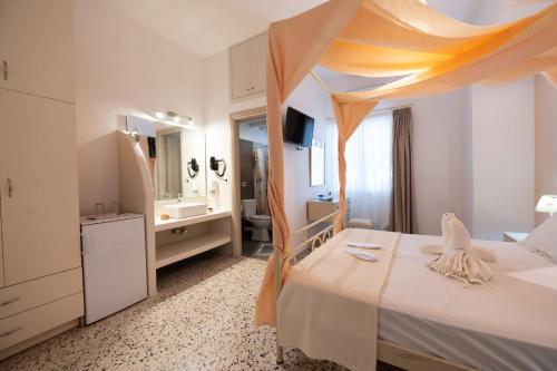 Postel nebo postele na pokoji v ubytování Giasemi Room No1 Kimolos