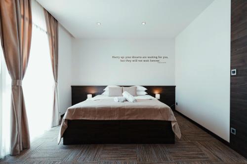 Cama o camas de una habitación en Hotel Emporium
