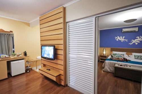 TV a/nebo společenská místnost v ubytování Thermas Park Resort & SPA by Hot Beach