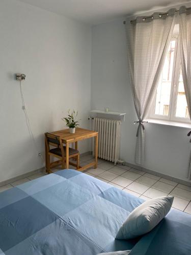 Ένα ή περισσότερα κρεβάτια σε δωμάτιο στο APPARTEMENT SPACIEUX