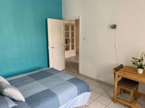 Posteľ alebo postele v izbe v ubytovaní APPARTEMENT SPACIEUX