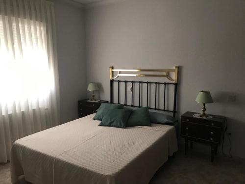 Un pat sau paturi într-o cameră la El Bosan