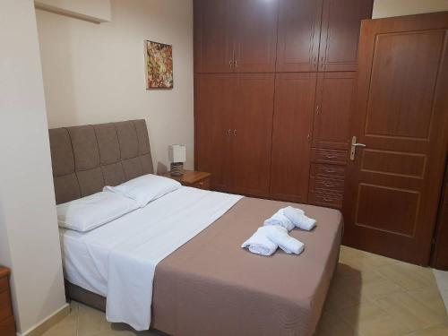 Posteľ alebo postele v izbe v ubytovaní Spyros Apartments