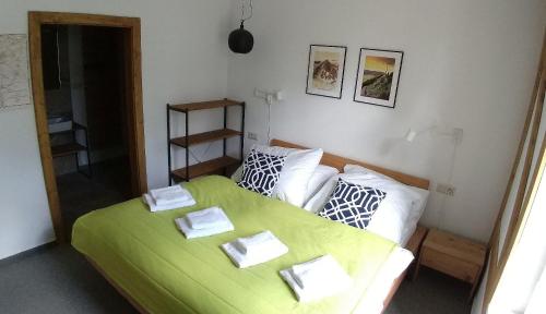Postel nebo postele na pokoji v ubytování Apartment Nr 4, Vila Kollár Dolný Smokovec, Vysoké Tatry