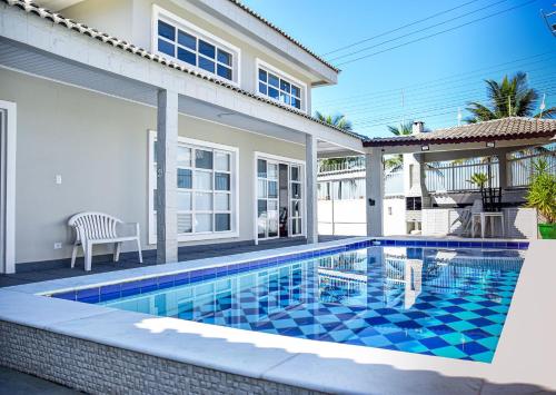 Casa de temporada Casa beira-mar c piscina churrasq Praia Grande SP Menor preço em Casa de temporada Casa beira-mar c piscina churrasq Praia Grande SP