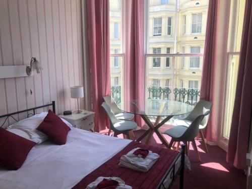 Postel nebo postele na pokoji v ubytování The Sherwood Guest House