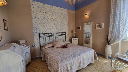 Katil atau katil-katil dalam bilik di La Terrazza nel cuore di Capoliveri