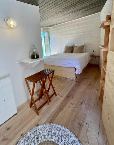 Ένα ή περισσότερα κρεβάτια σε δωμάτιο στο Little California - Adorable Studio Indépendant