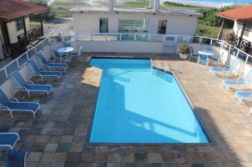 Kolam renang di atau dekat dengan CASA GORETE PRAIA DAS DUNAS RESIDENCE CLUB