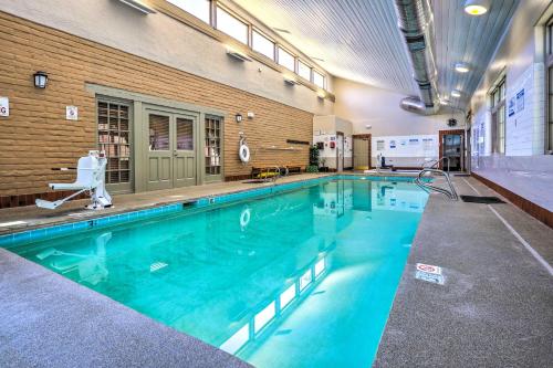 a large swimming pool in a building at Traditional-Style Adobe Casita - Walk to Dtwn in Santa Fe