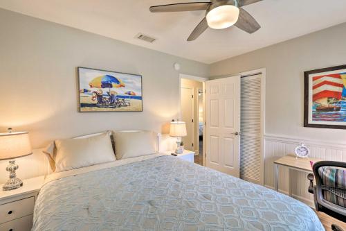 a bedroom with a bed and a ceiling fan at about 8 Mi to FSU Bright Tallahassee Retreat! in Tallahassee