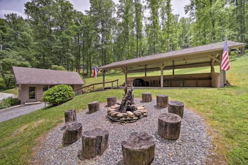 a fire pit in the middle of a park at Private Fire Pit and Creek Bryson City Retreat! in Bryson City